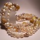 Necklace of five strands with pearls, citrine quartz and agate